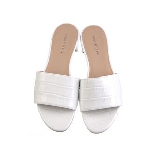 Stuart Weitzman white leather slides